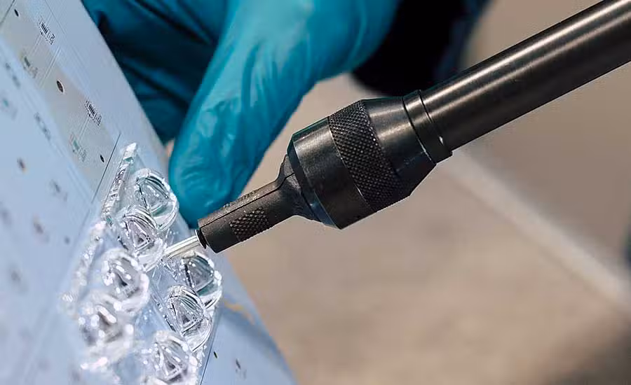 Blind rivets being installed with a rivet gun demonstrating one sided fastening